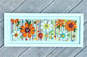 fused glass orange and white flowers on picutre frame