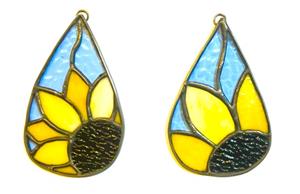 two stained glass sunflower in teardrop shape