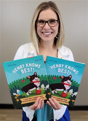 author holding her books