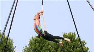 Acrobat doing trapeze style routine