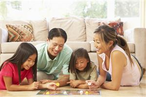 family playing a board game