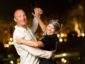 Couple Dancing to Band