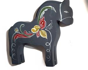 wooden horse painted with Rosemaling technicque