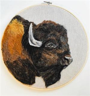 imbroidery hoop of buffalo done in felt