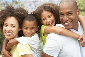 Multi-Generational Family Smiling for Camera